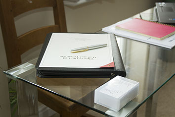 A Will on a desk with a pen