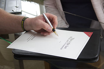 Hand signing a will